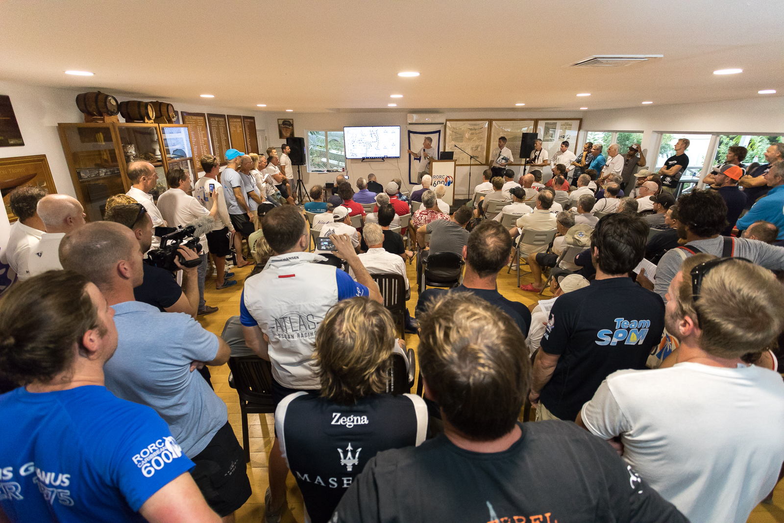 A packed Skippers Briefing before the start of the race with Chris Stone, RORC Racing Manager and Mick Broughton's weather briefing © RORC/Arthur Daniel 