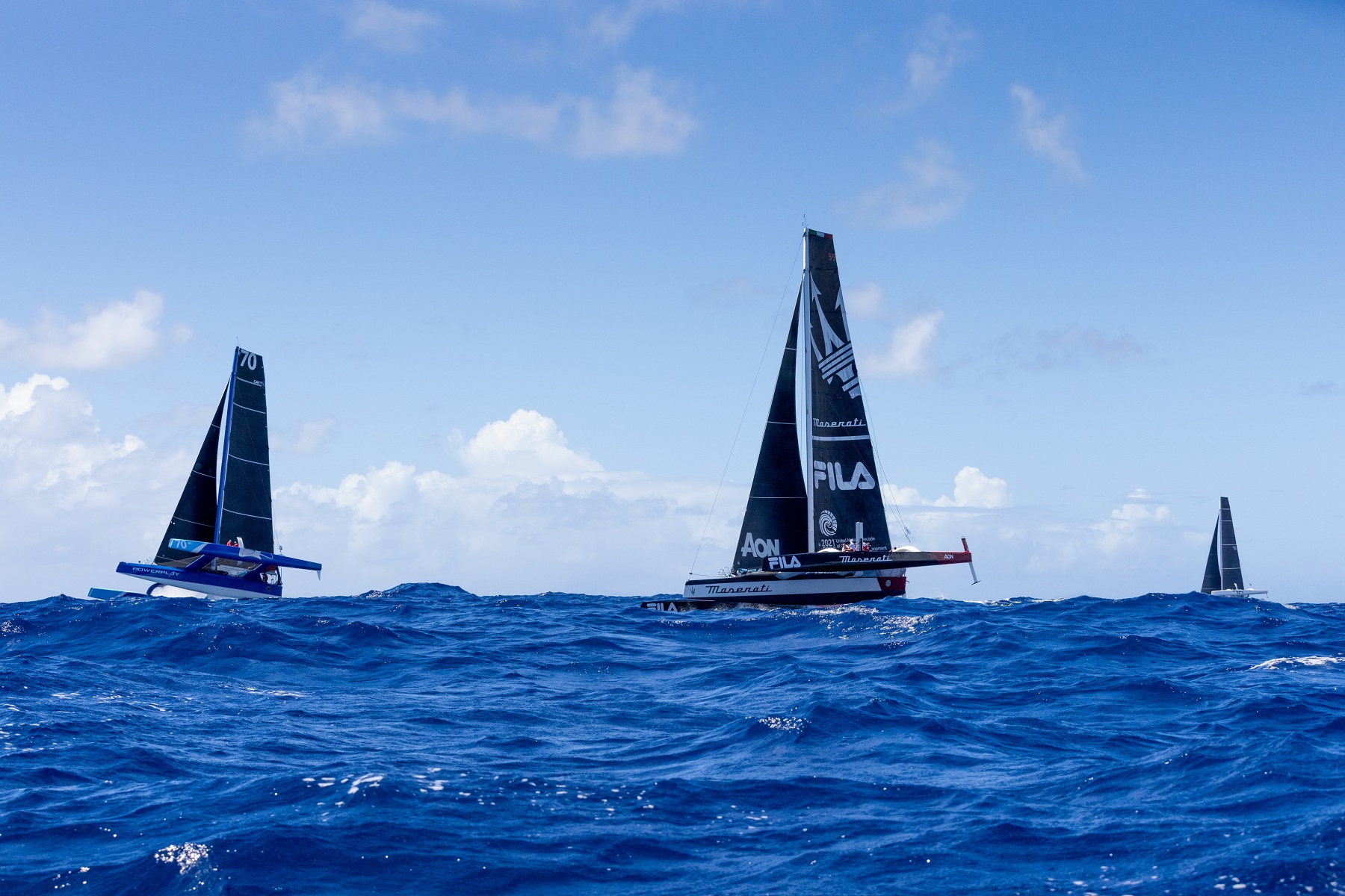 A battle is raging between the three foremost multihulls, with Giovanni Soldini’s Maserati (ITA) and Jason Carroll’s Argo (USA) less than a mile apart © Arthur Daniel/RORC