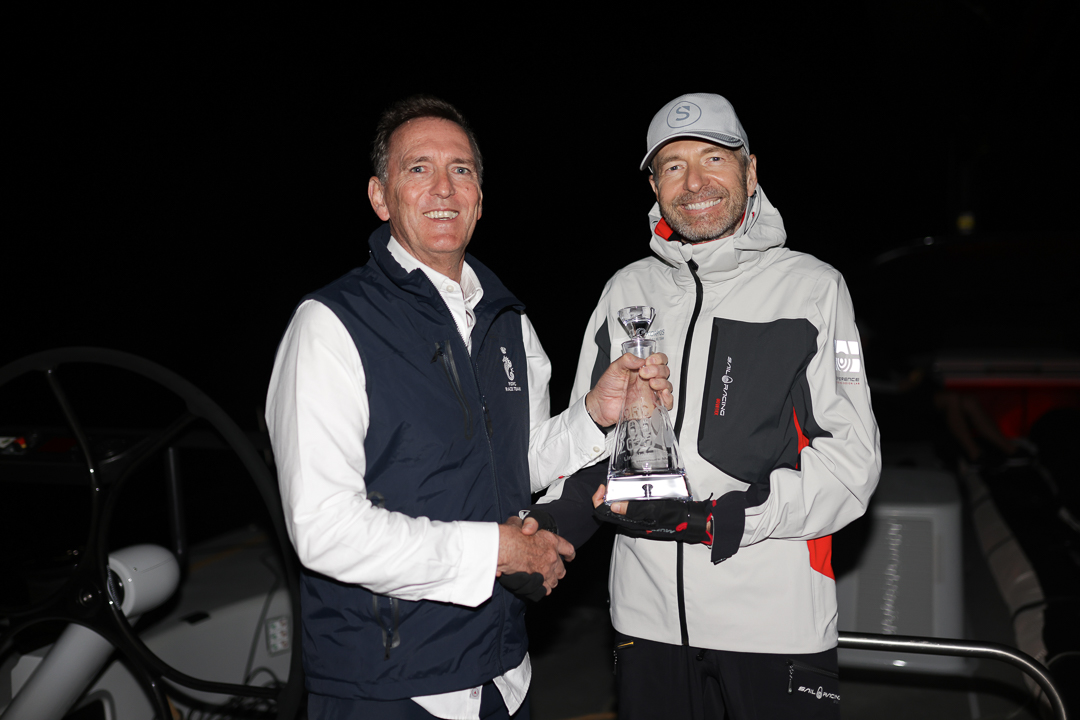 RORC CEO Jeremy Wilton presents Dmitry Rybolovlev, owner of Skorpios with the Monohull Line Honours Trophy © Arthur Daniel/RORC 