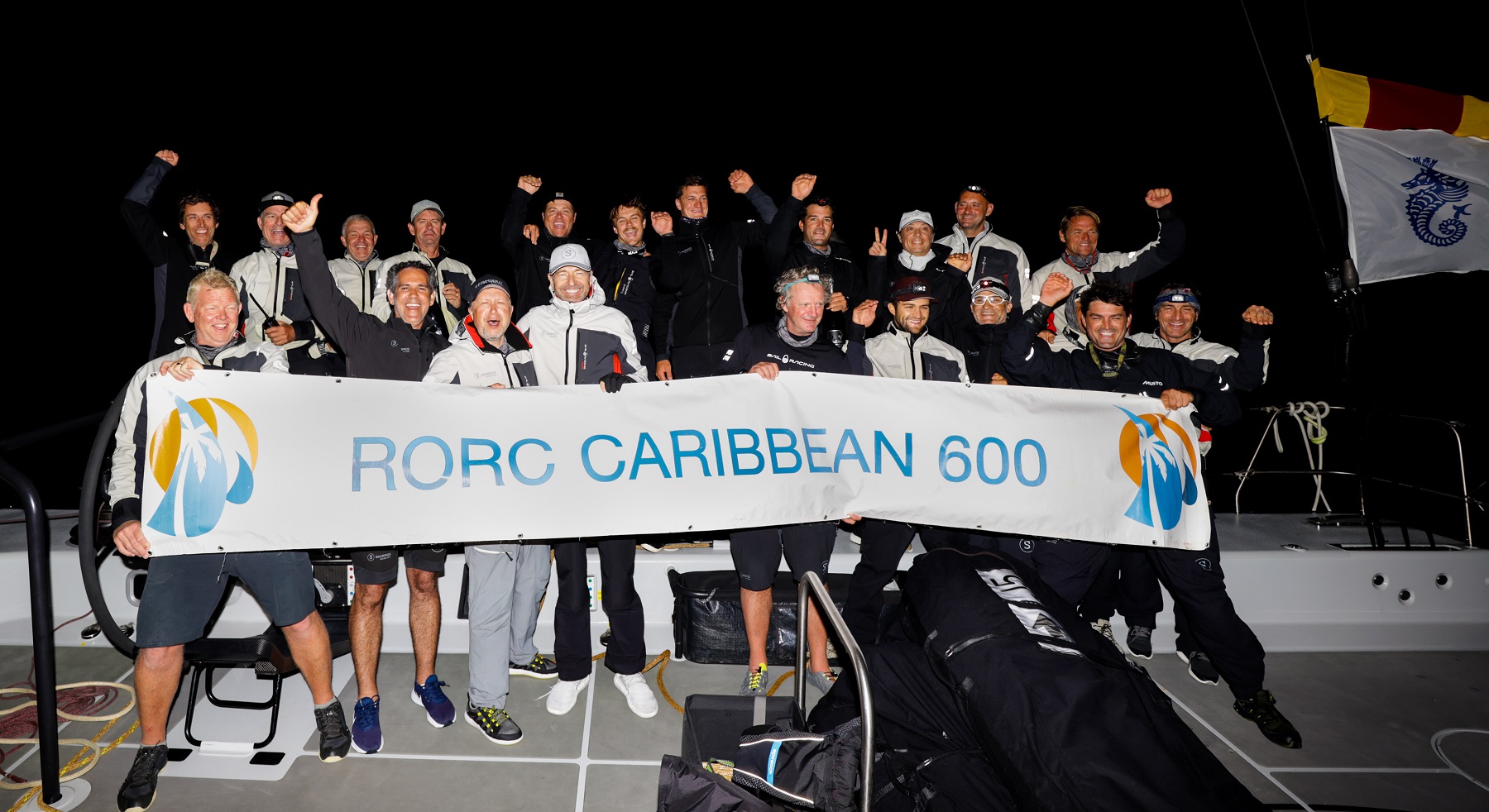 Celebrations on board for Team Skorpios after taking Monohull Line Honours © Arthur Daniel/RORC 