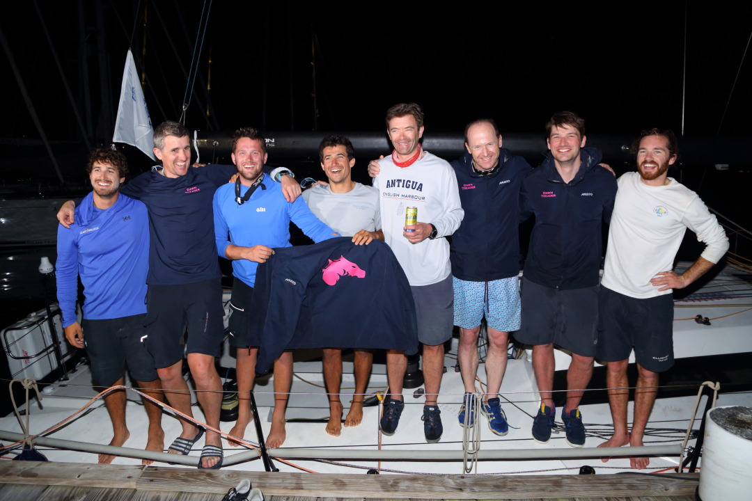 The crew of Dawn Treader enjoyed a cold Carib beer and warm welcome  after their close finish © Tim Wright/Photoaction.com